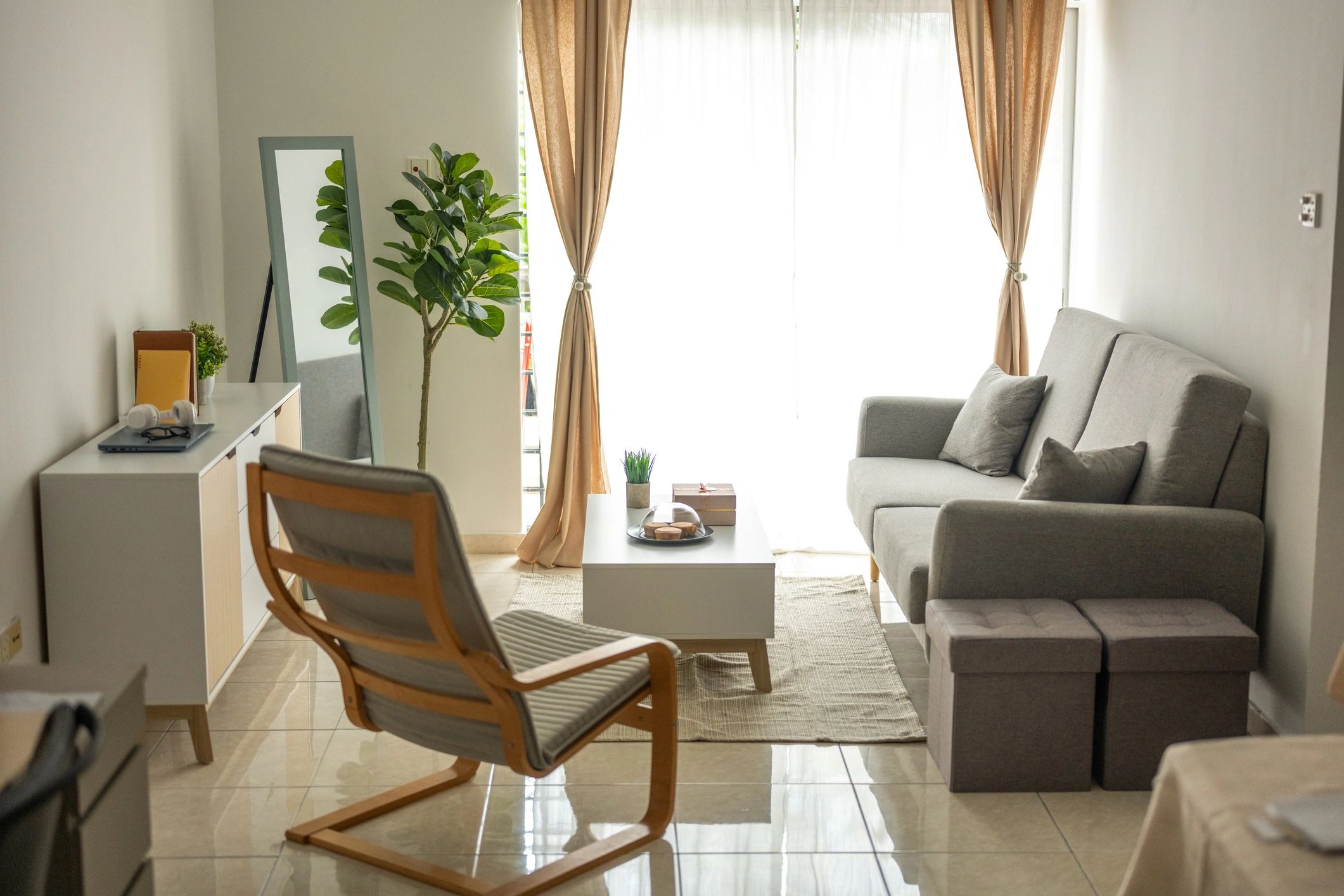 Cozy minimal living room with armchair and coffee table