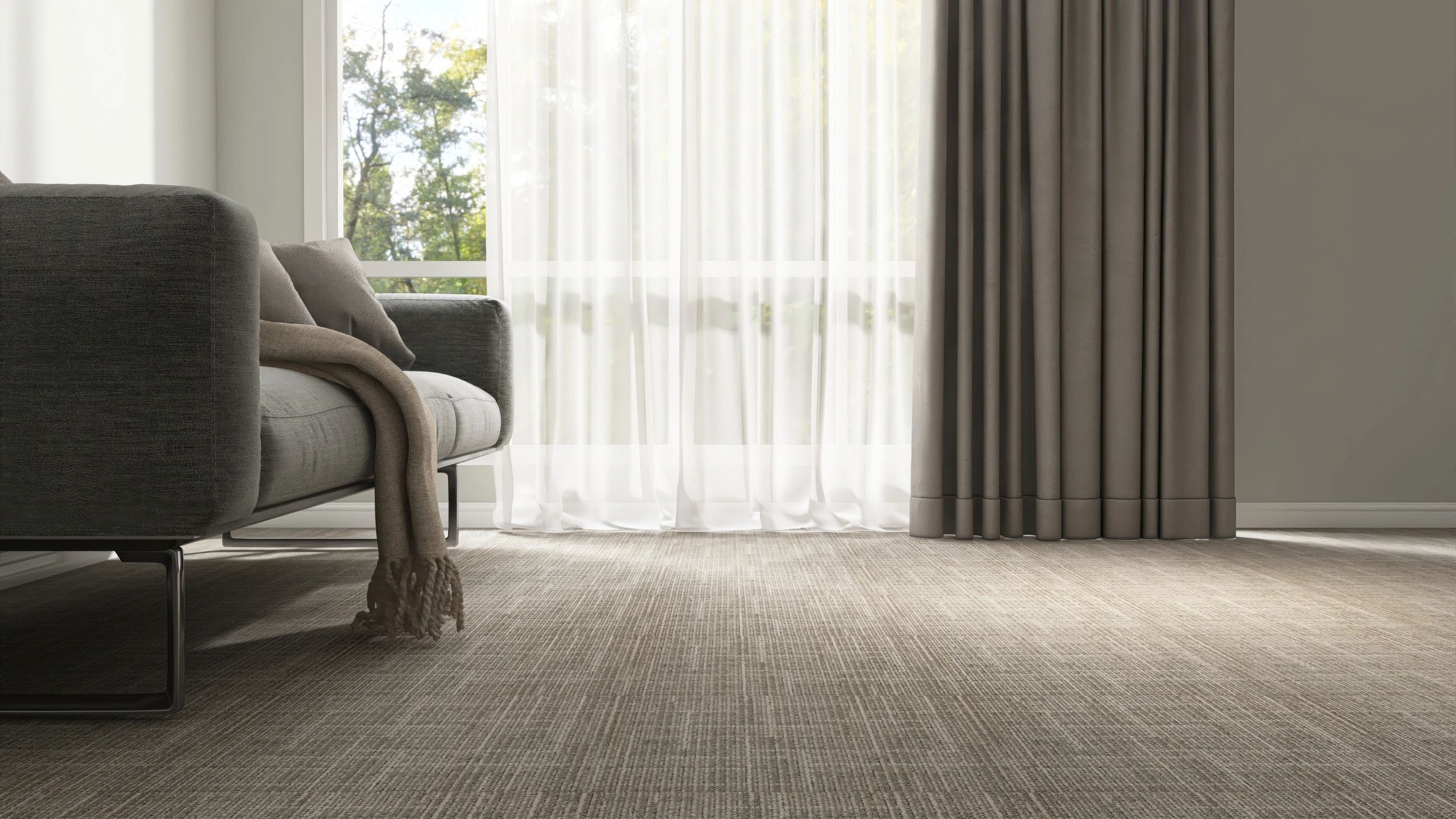 Neutral living room with curtains and soft sunlight